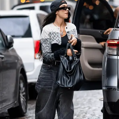 Dua Lipa in a gray bolero