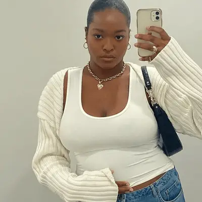 Olivia Rodrigo in a striped bolero