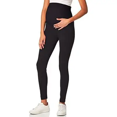Pregnant woman in black leggings