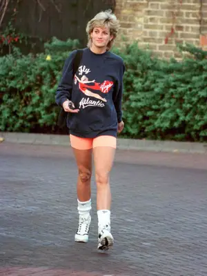 Princess Diana wears a navy blue sweatshirt that says 