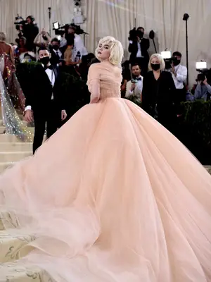 Billie Eilish wears a nude tulle Oscar de la Renta gown and blonde bob hairstyle to the 2021 Met Gala