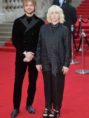 Billie Eilish and Finneas wear Gucci and Armani suits to the world premiere of No Time to Die