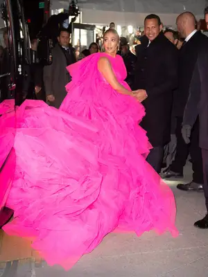 Jennifer Lopez wears a hot pink tulle Giambattista Valli gown to the Second Act premiere