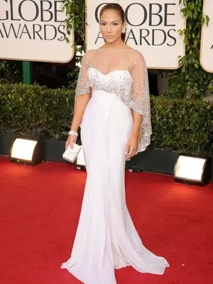 Jennifer Lopez wears a white crystal-embellished Zuhair Murad gown to the 2011 Golden Globe Awards