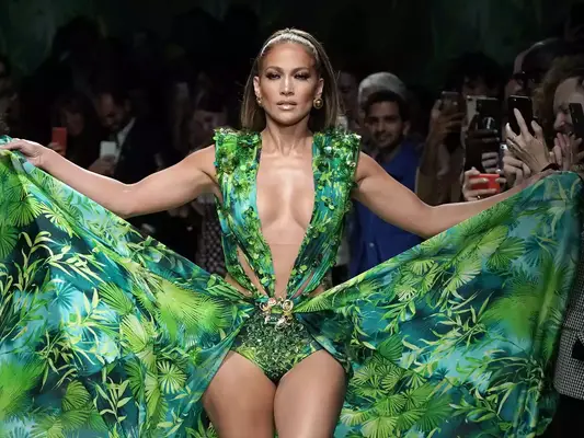Jennifer Lopez walks the Versace Spring 2020 runway in a recreation of her 2000 Grammys jungle print dress