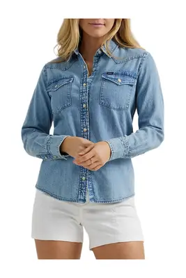 Tyra Booker wearing a western denim inspired outfit.