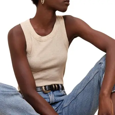 model wearing beige Banana Republic tank top