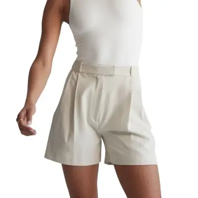 model wearing beige Re Ona shorts