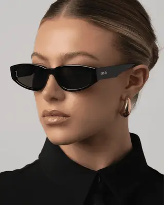 model wearing black sunglasses