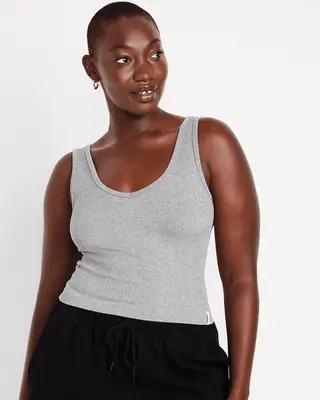 Model wearing a gray tank top