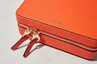 The Calpak Jewelry Case zipped closed