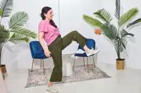 a woman kicks the Levenger Carrie Mini Jewelry Organizer during testing