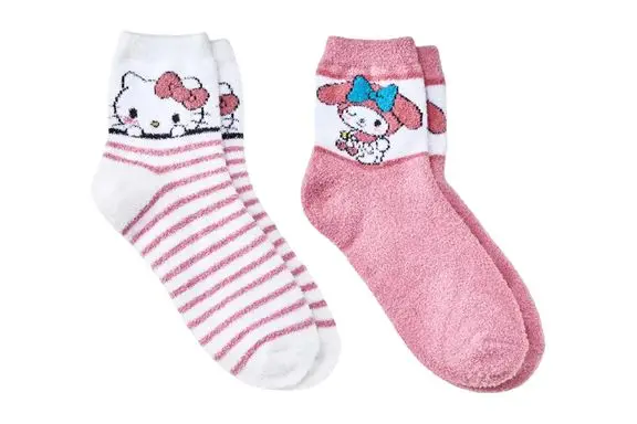 A person wearing Barefoot Dreams CozyChic Heathered Tennis Socks