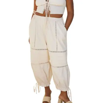 model wearing cream bloomers