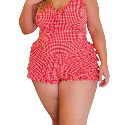 model wearing a red gingham short set