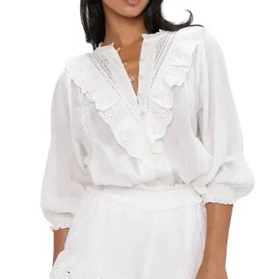 model wearing a white Show Me Your Mumu blouse