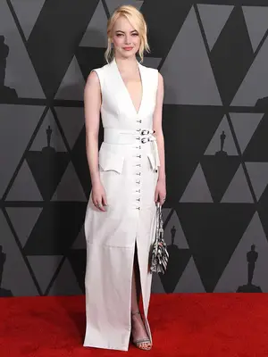 Emma Stone wears a white utilitarian Louis Vuitton gown to the 2017 Governors Awards
