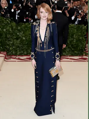 Emma Stone wears a light blue gown and robe to the Poor Things UK Gala Screening