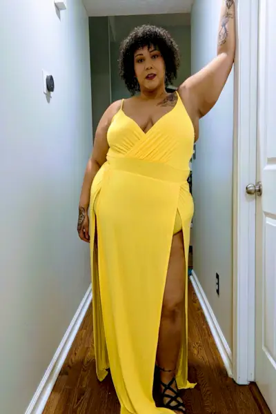 Fit woman exercises with dumbbells