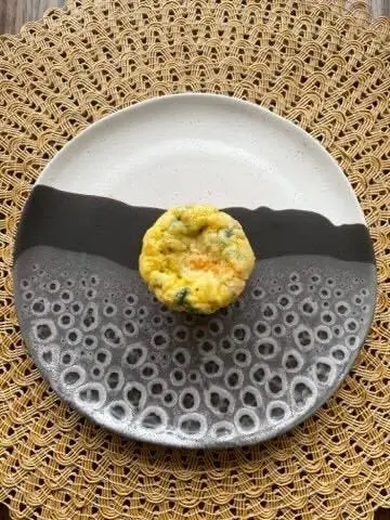 Closeup of young Asian athletic woman preparing protein shake at home. Diet and healthy food.