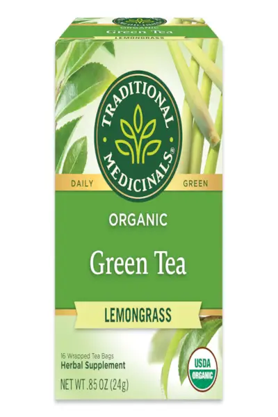 Wooden spoon with chia seeds on beige background. Flat lay, top view, copy space.