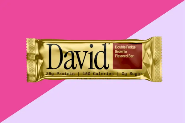 Fresh Orange Cocktail with Straw and a Sprig of Mint