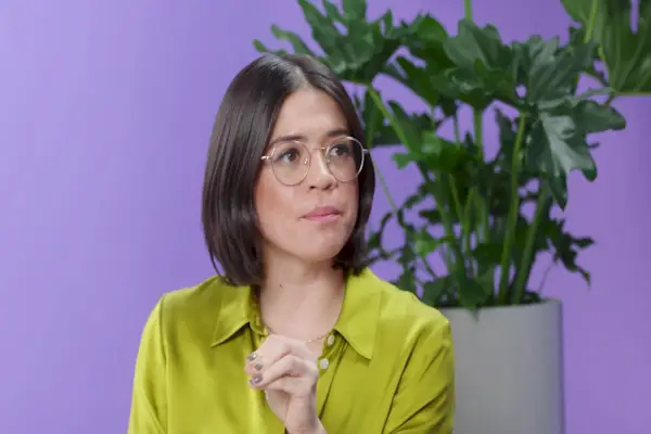 beautiful blonde woman doing sports practicing yoga against blue sky outdoors