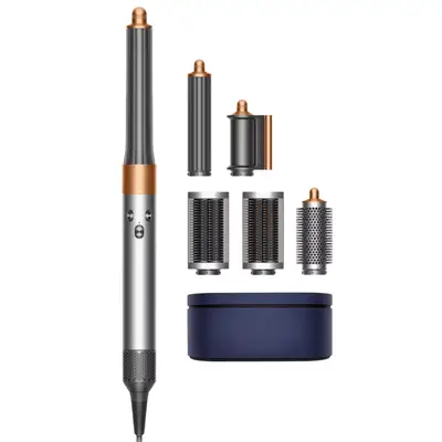 Several parts of the Dyson Airwrap hair dryer separated 