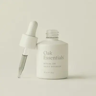 Oak Essentials Ritual Oil bottle with dropper beside it