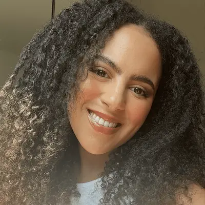 Olivia Hancock, MYM Beauty editor, showing off curls after using Cecred Hydrating Conditioner