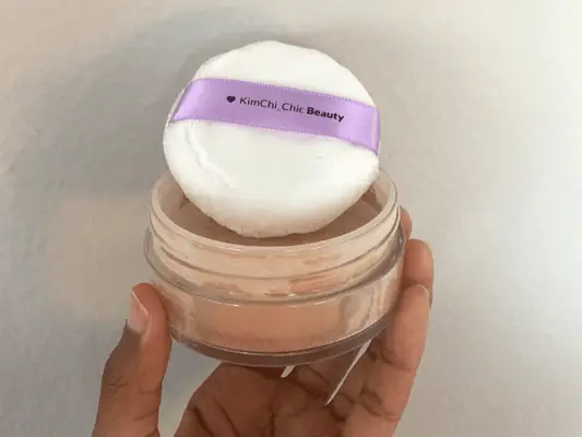 Packaging shot of KimChi Chic Beauty Setting Powder