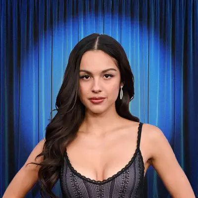 Olivia Rodrigo in a spotlight