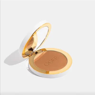 White and gold powder compact 