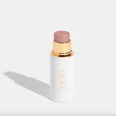 White Ogee stick with pink product coming out of the top