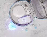 Glo Science Brilliant Deluxe Teeth Whitening Kit displayed in its case