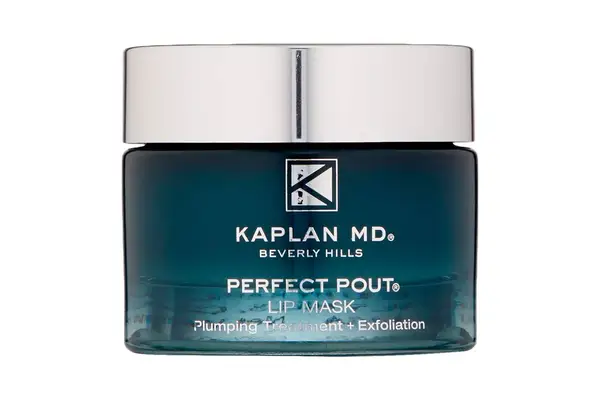 a person applying the CosRX Lip Sleep Propolis Sleeping Mask to their lips