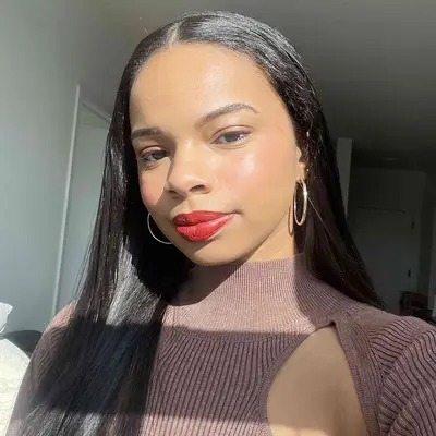 Photo of pink blush in small tube adorned with a pink and gold top.