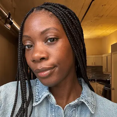 Jasmine Phillips, social media editor wearing juvia