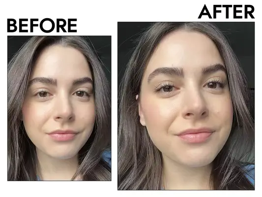 Hand holding a Maybelline Lash Sensational Sky High Mascara wand