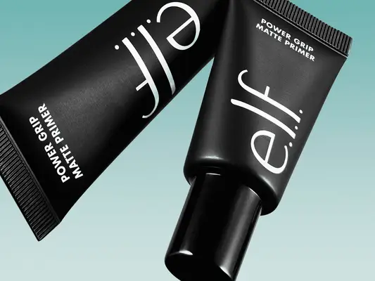 e.l.f. Cosmetics Power Grip Matte Primer on a blue background.