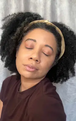 The author with the completed sparkly glam makeup look