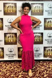 A woman wearing the Saylor Rhiannon Maxi Dress from Nuuly