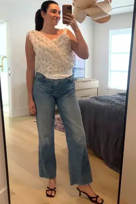 A woman wearing the For Love Lemons Harper Top from Fashionpass