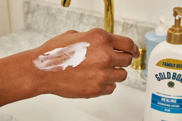 Gold Bond Healing Hydrating Lotion on back of hand