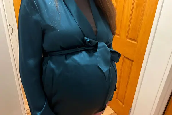 Closeup of belt tied on the Cuyana Washable Charmeuse Robe