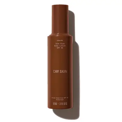 Brown thin loti9on bottle with gold writing