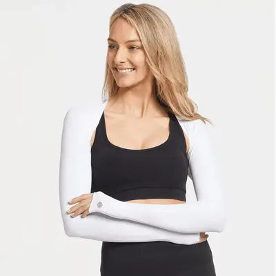 Model wearing white long sleeve wrap 