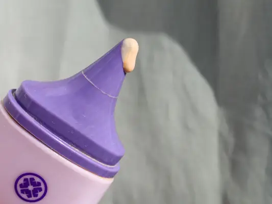 Close up of the product coming out of the tube of sunscreen