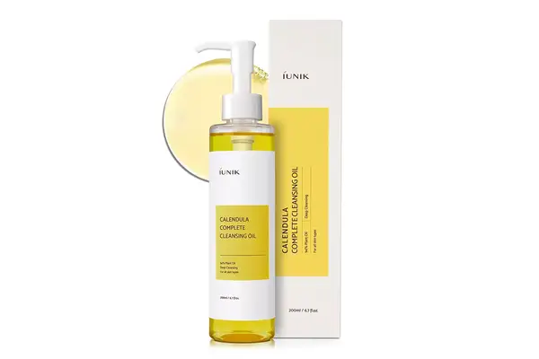 A person adding Beauty of Joseon Ginseng Cleansing Oil into their palm