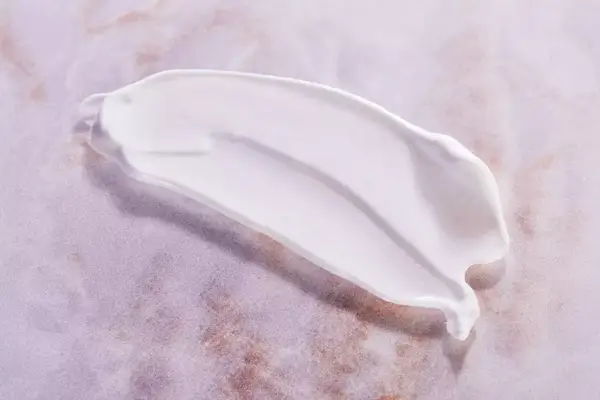 Person Before And After Applying La Roche-Posay Toleriane Double Repair Face Moisturizer